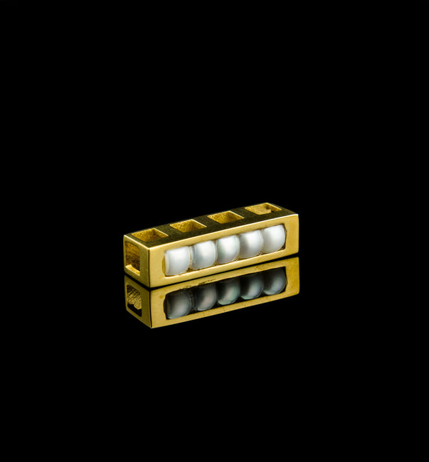 Quadruple Morphic Block and Pearls